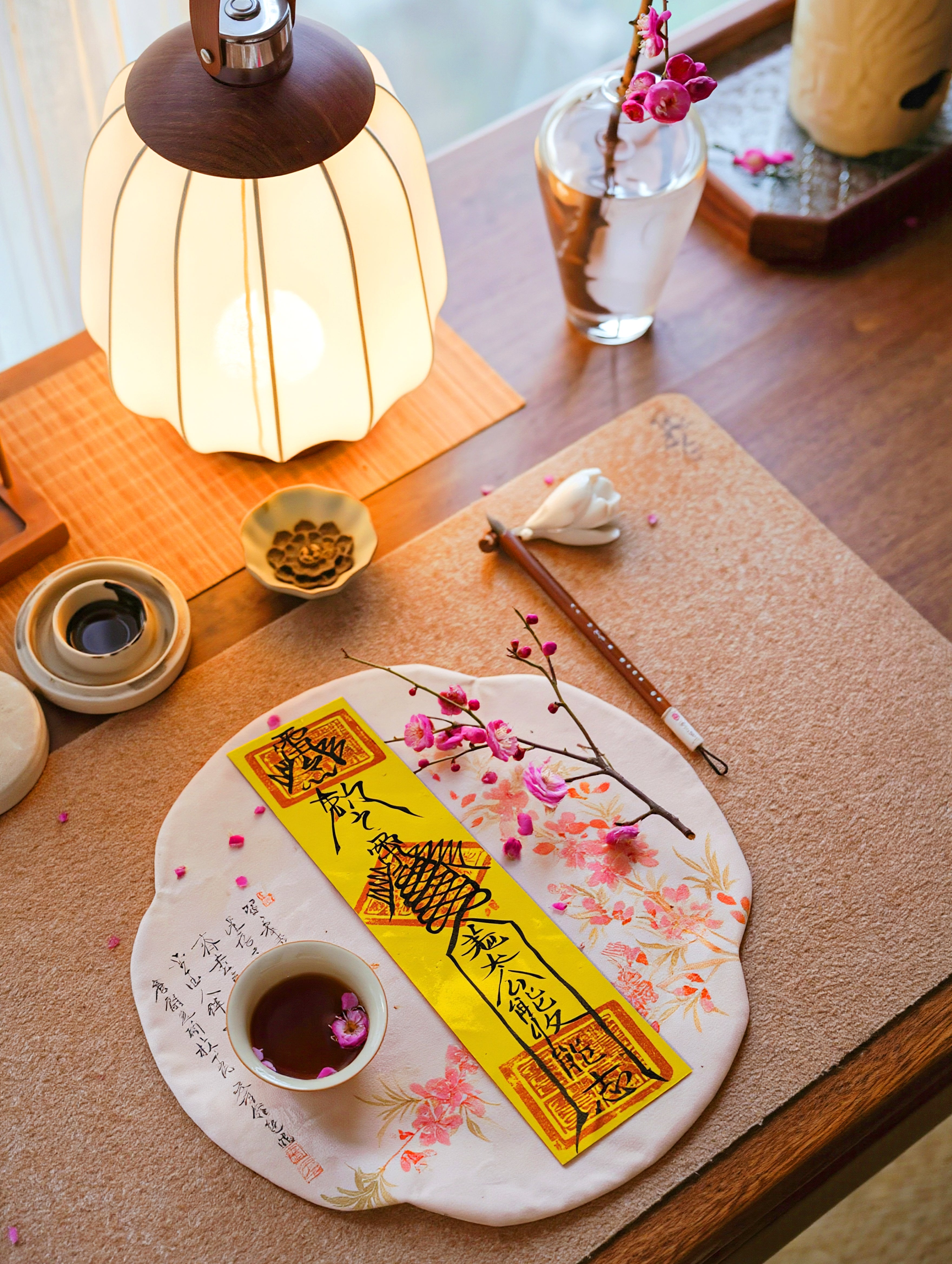Handcrafted Taoist-inspired family peace talisman placed in a peaceful home setting.